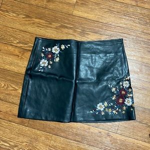 Black leather mini skirt with embroidery size M from Vanilla Star